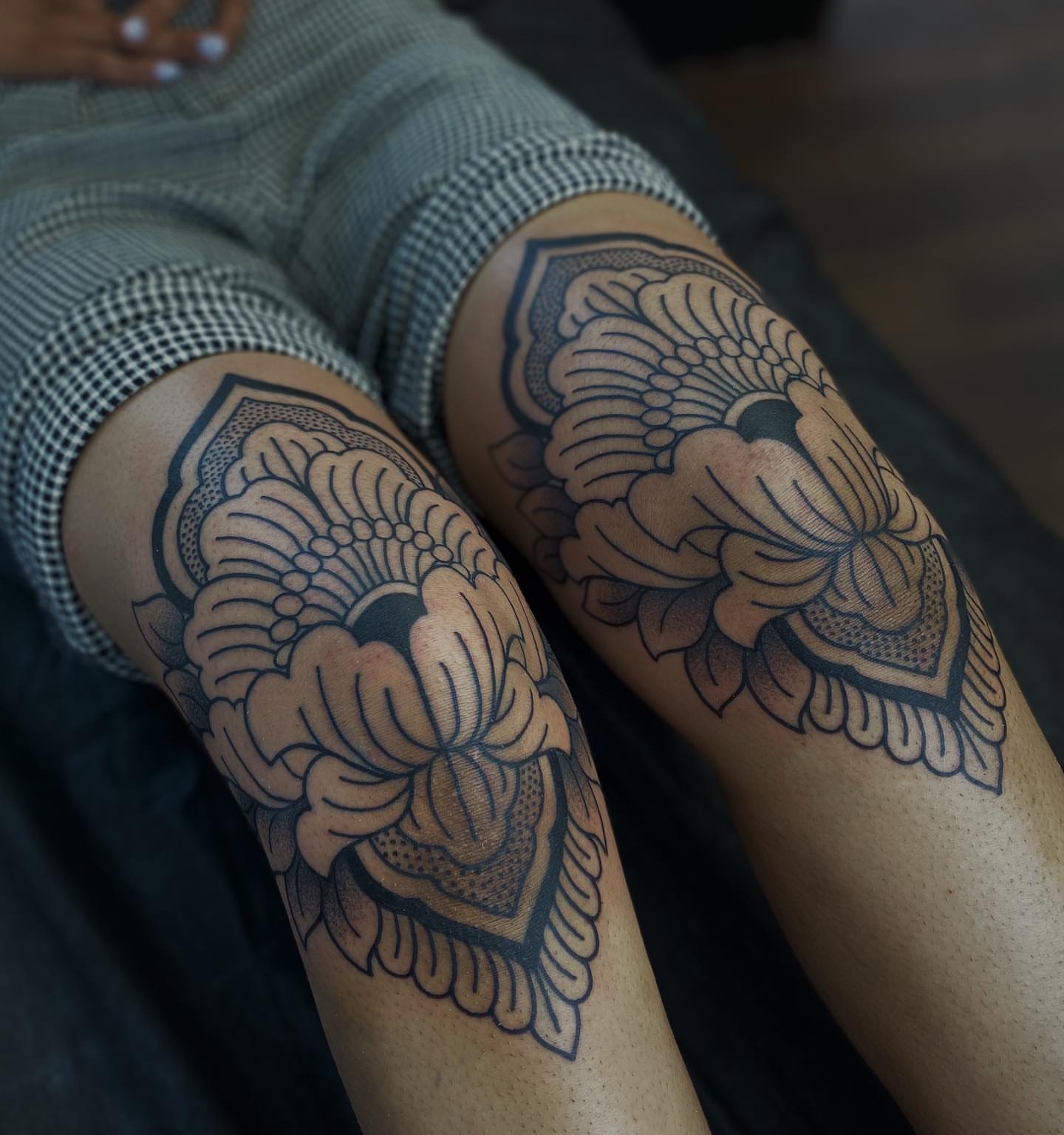 Floral mandala American traditional tattoo on the thigh by Veronica
