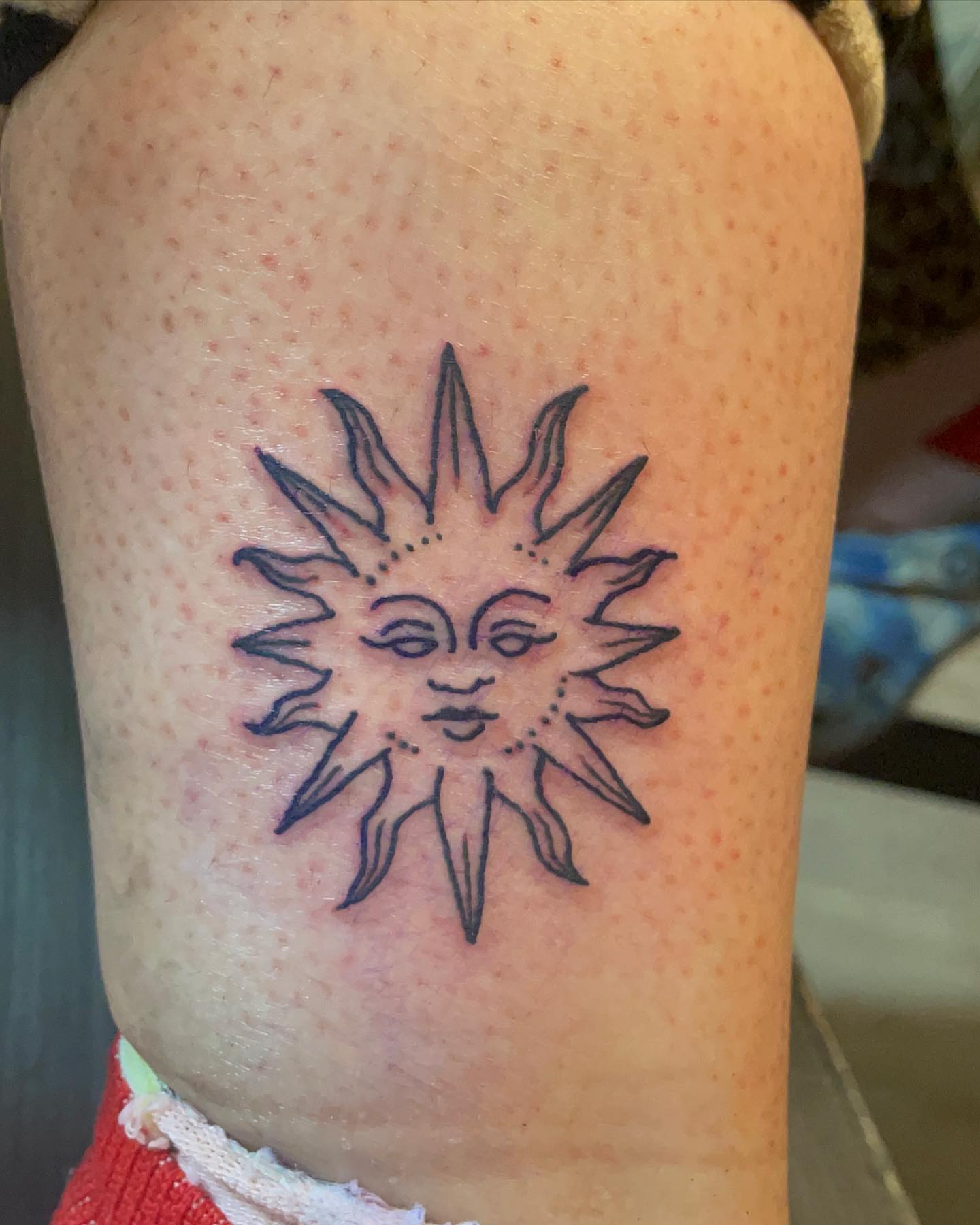 Sun American traditional tattoo on the forearm by ART