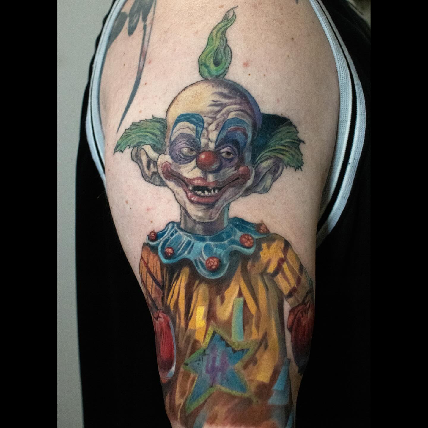 Clown realism tattoo on the forearm by Marvin Silva