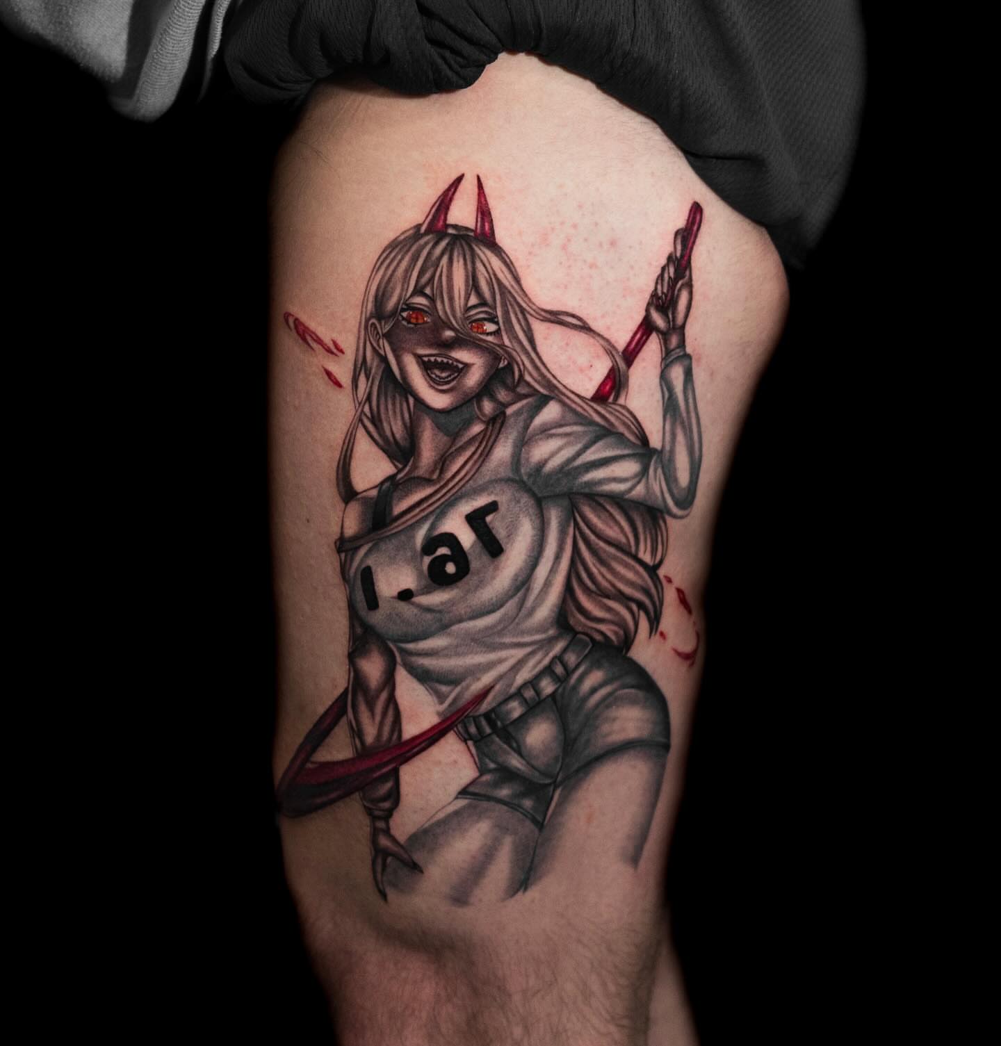 Demon girl anime tattoo on the thigh by Tattoo Artist
