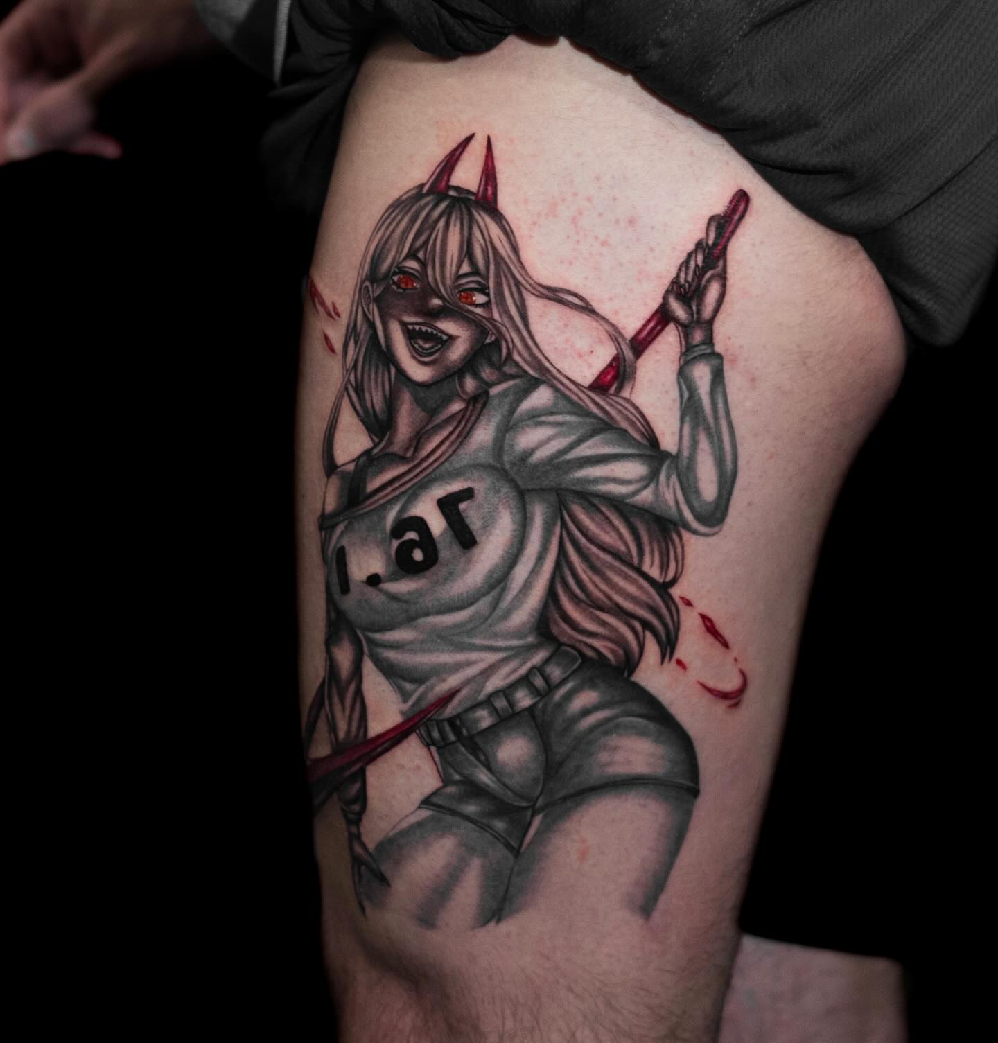 Anime character anime tattoo on the thigh by Tattoo Artist