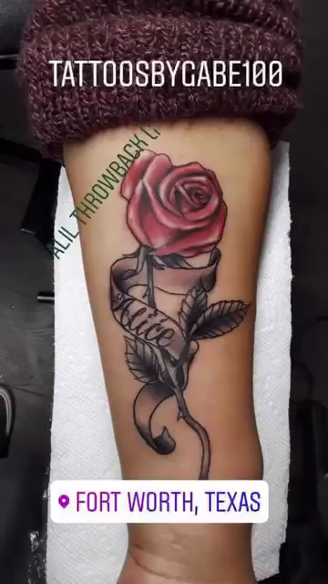 Rose and ribbon realism tattoo by Gabriel Lawton