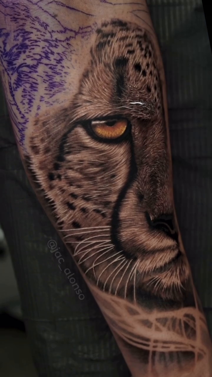 Cheetah portrait realism tattoo by Jesus Alonso
