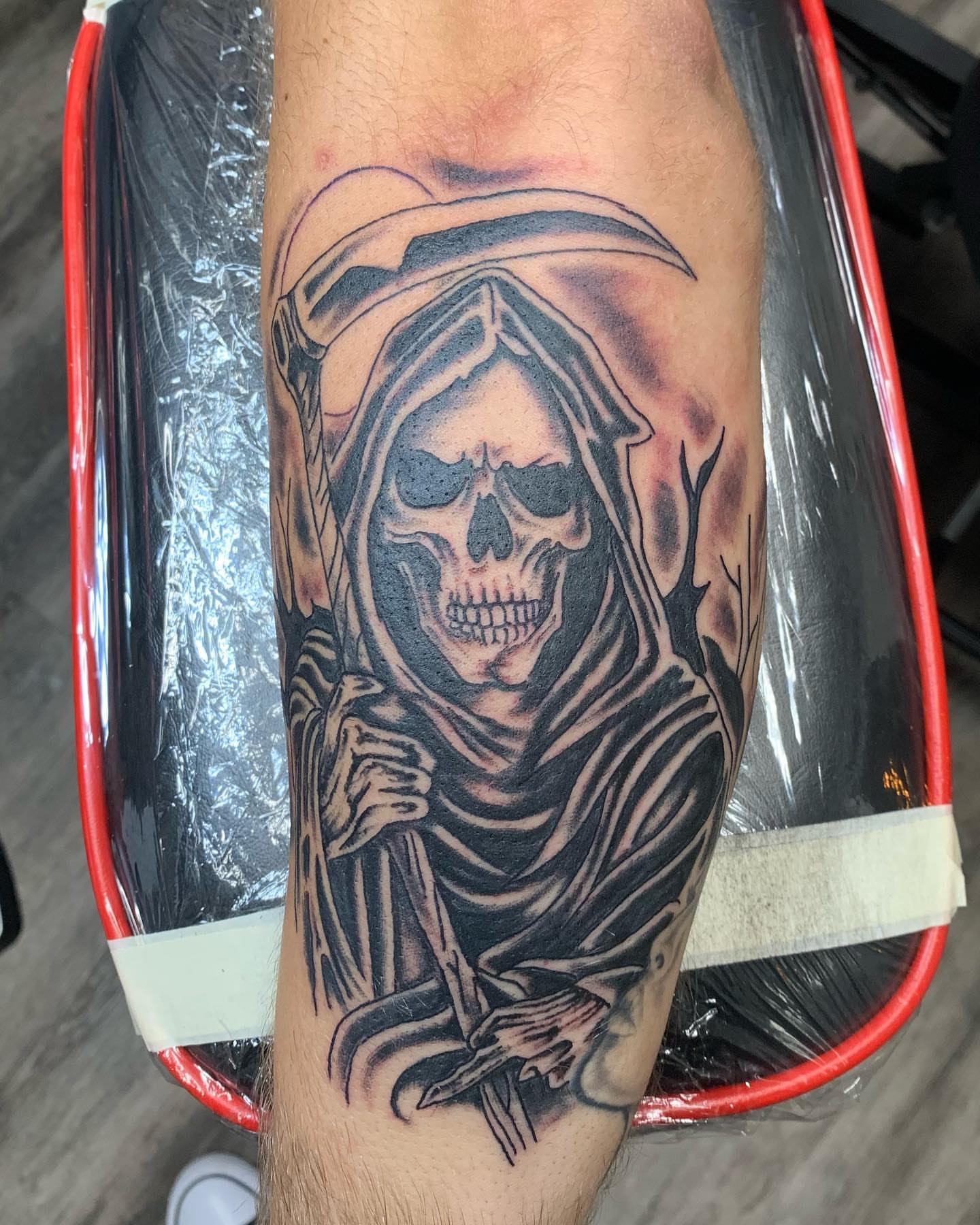 Grim reaper realism tattoo on the forearm by @goat76