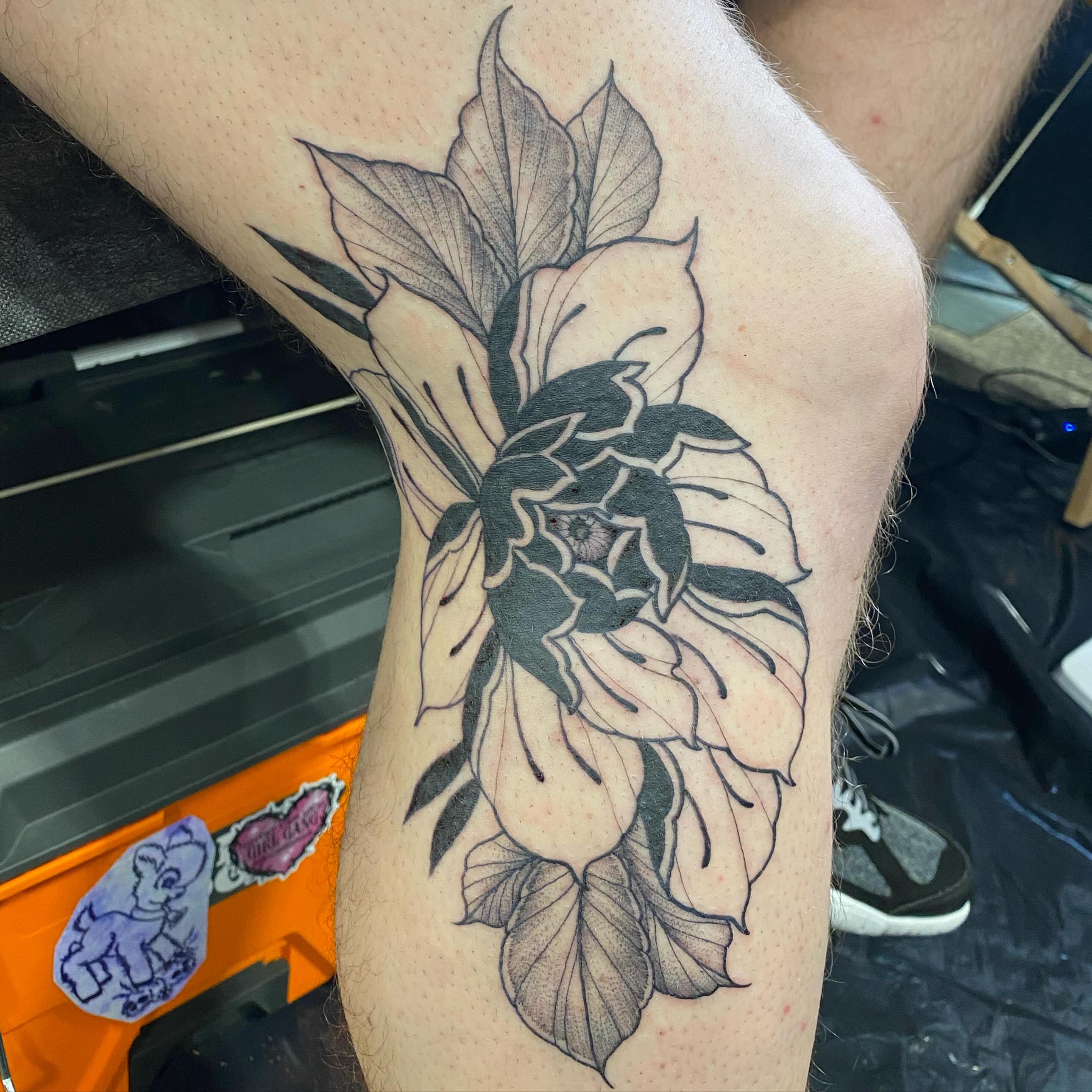 Flower dotwork tattoo on the thigh by Amber Lea, Kansas City, Kansas