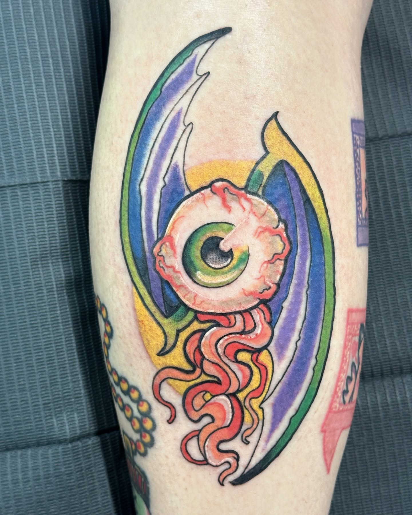 Eye with tentacles American traditional tattoo on the forearm by Sarah Bobby, Houston, Texas