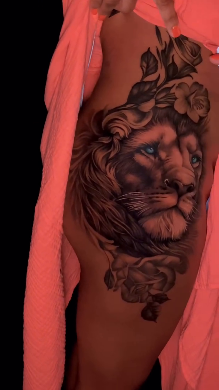 Lion head with flowers realism tattoo by Sean Flood