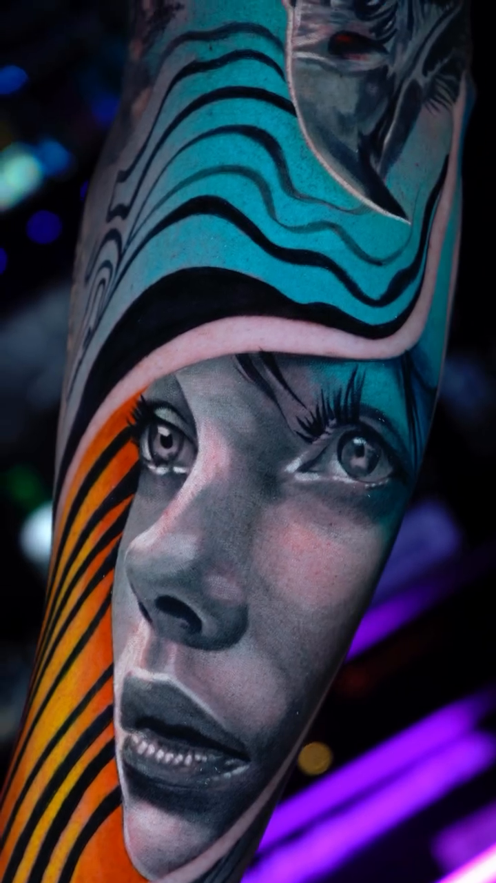 Woman's face with abstract waves realism tattoo by Andres García Baeza