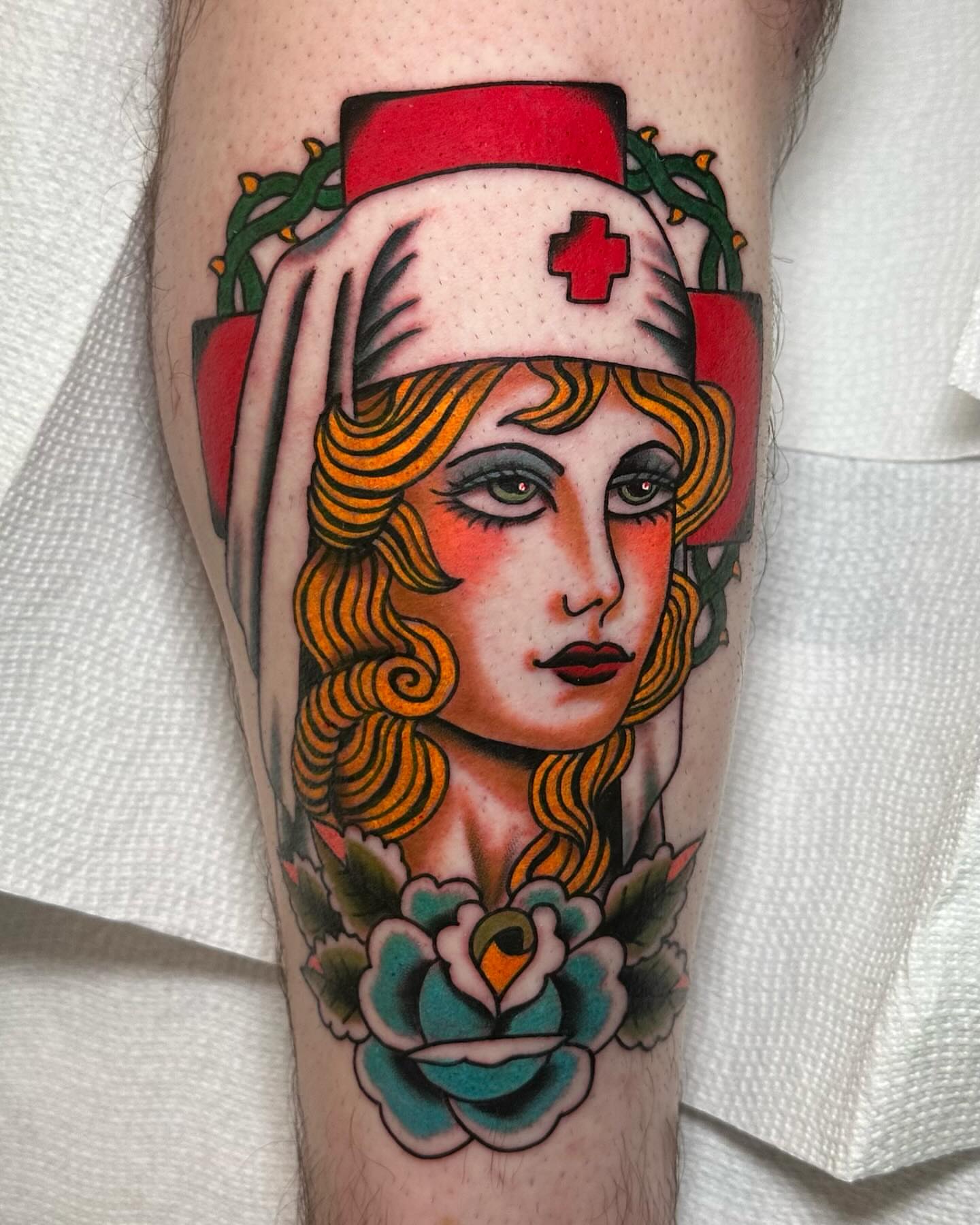 Nurse portrait American traditional tattoo on the forearm by 𝕯𝖗𝖊𝖜 𝕲𝖎𝖑𝖊𝖘 𝕵𝖆𝖙𝖙𝖔𝖔, Addison, Texas