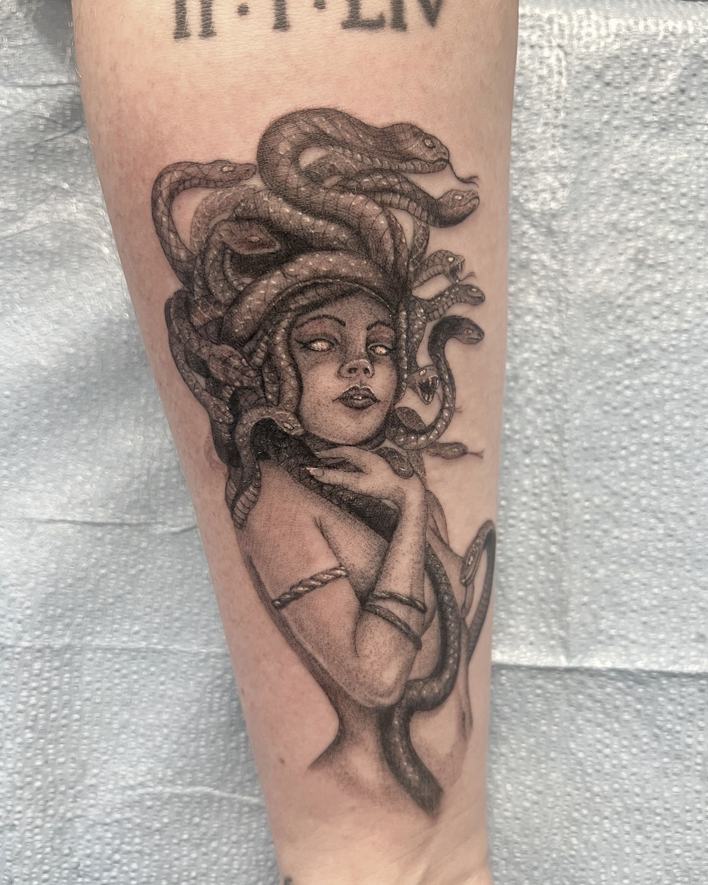 Medusa realism tattoo on the forearm by sam cedar geller 🐝