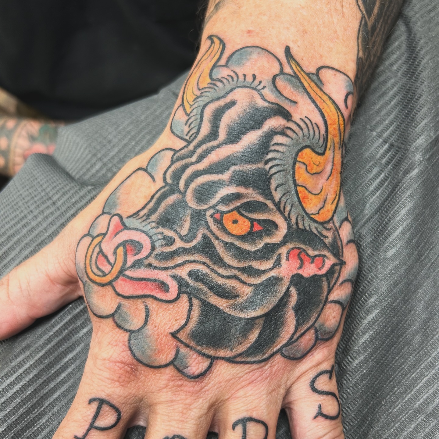Bull American traditional tattoo on the hand by Patricia Cunningham