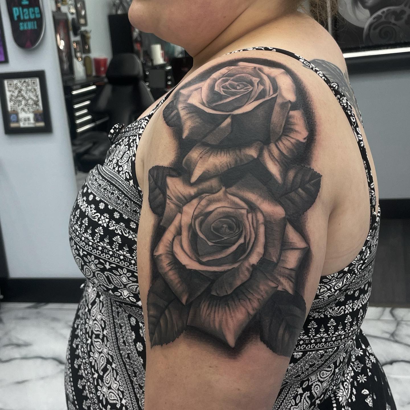 Roses black and grey tattoo on the shoulder by Austin Jones