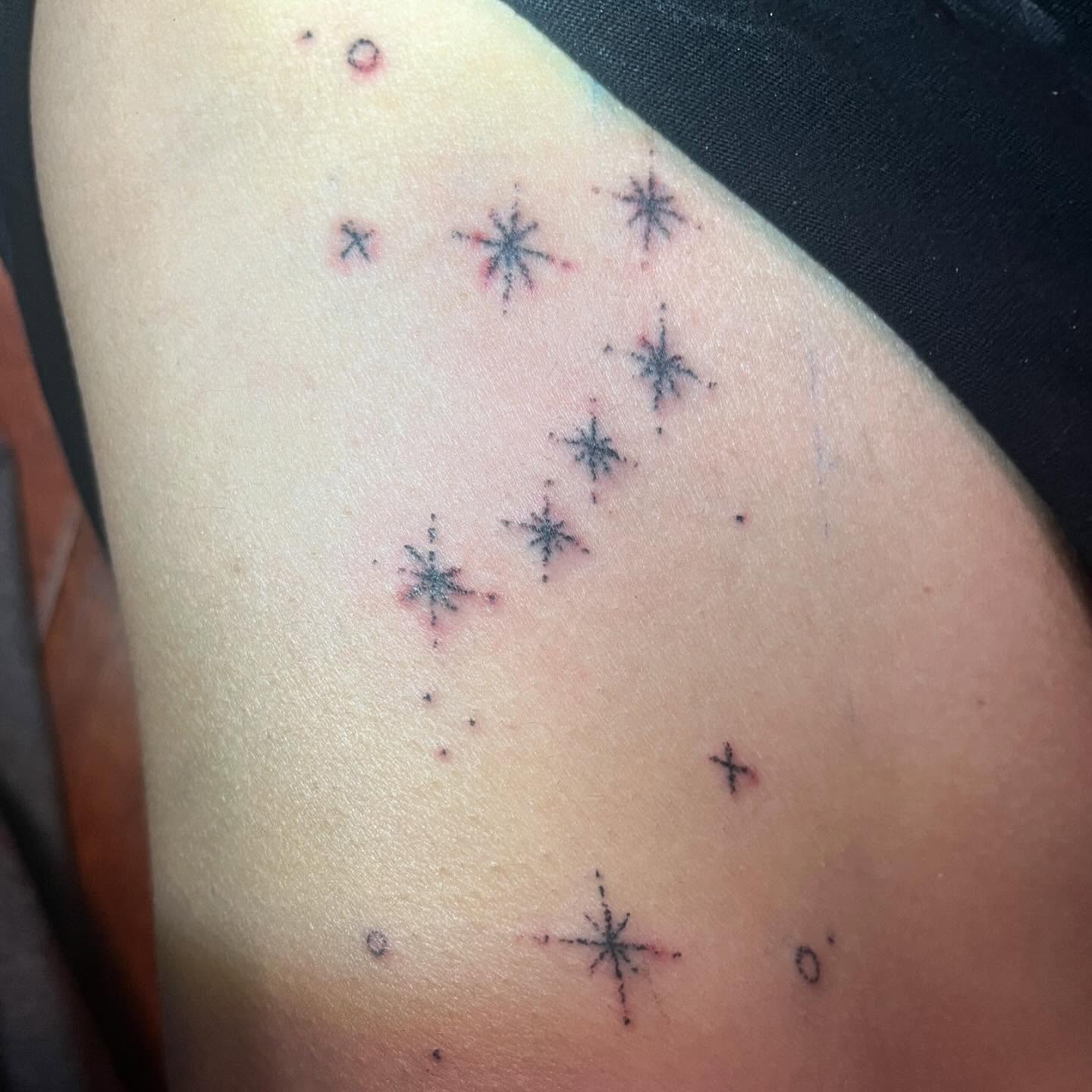 Snowflakes dotwork tattoo on the shoulder by hana