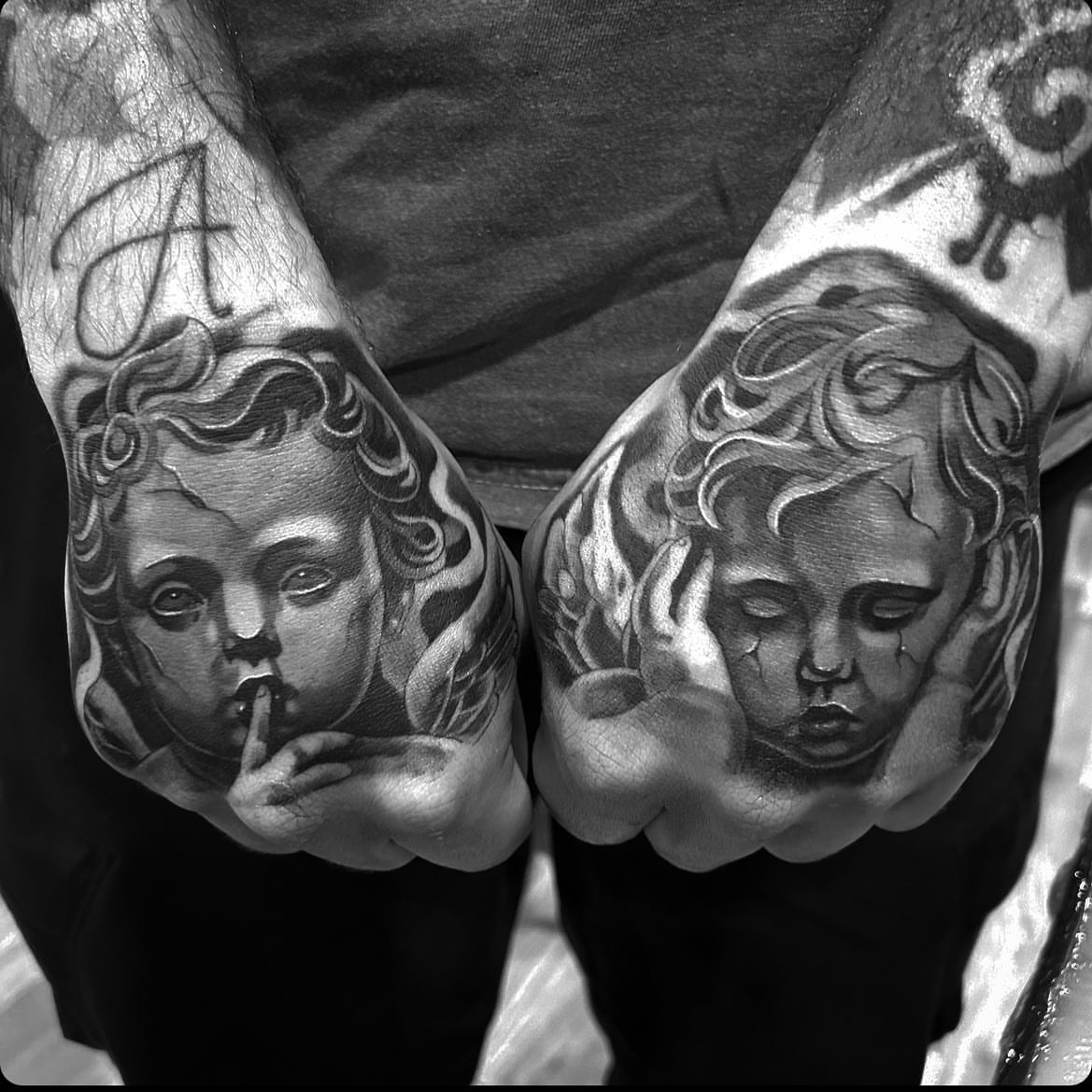 Child's face realism tattoo on the forearm by Alex Cruz 707