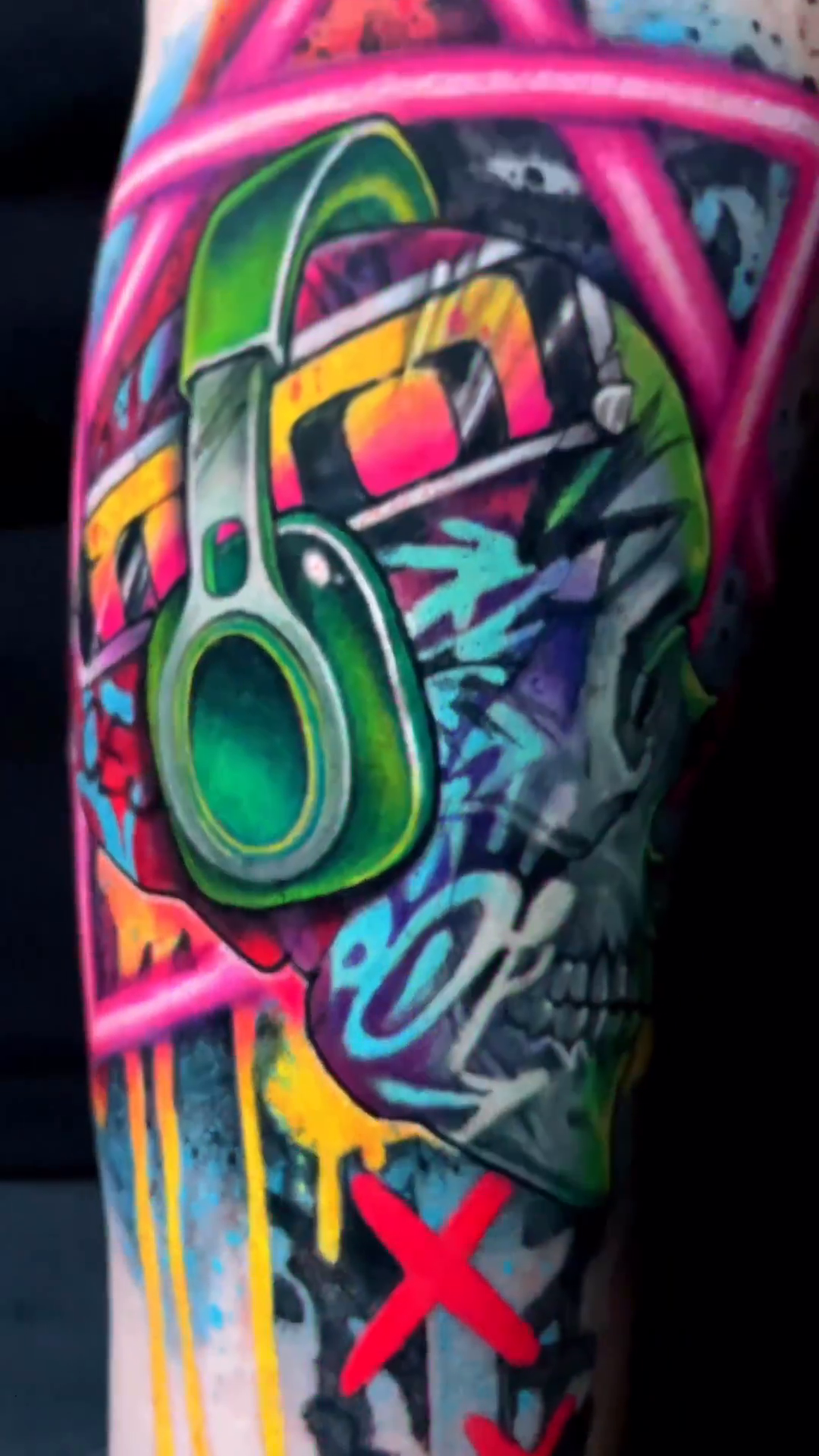 Skull with headphones new school tattoo by Tattoo artist in Seattle, WA