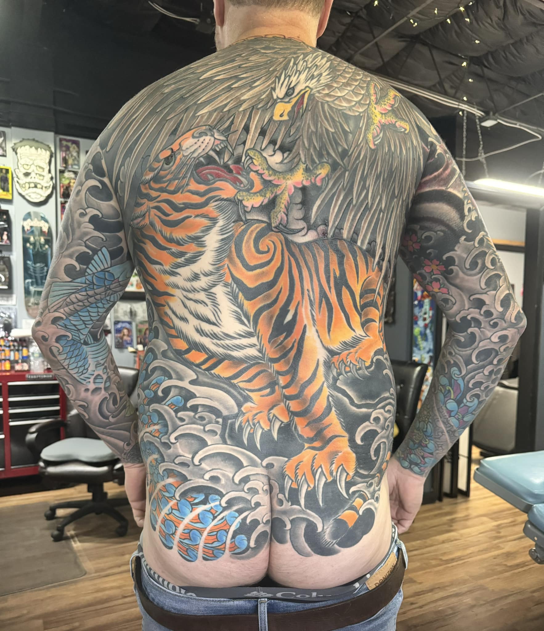 Tiger and griffin japanese irezumi tattoo on the back by Dave Robinowitz