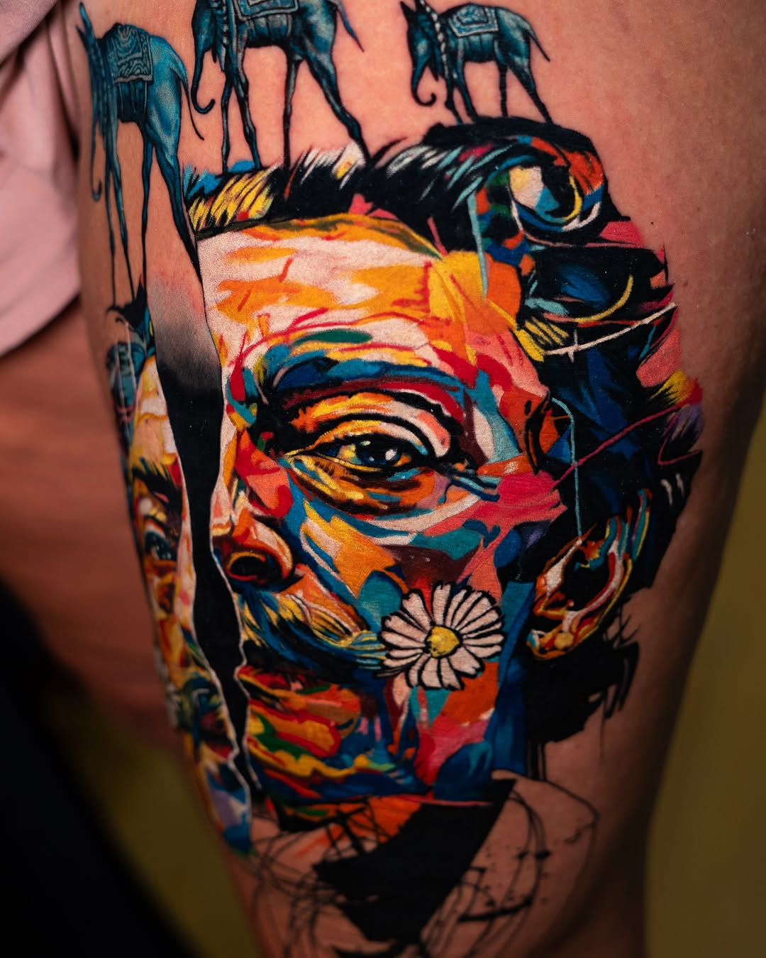Portrait with elephants surrealism tattoo on the thigh by Israel De Jesus Legonier Aguliera