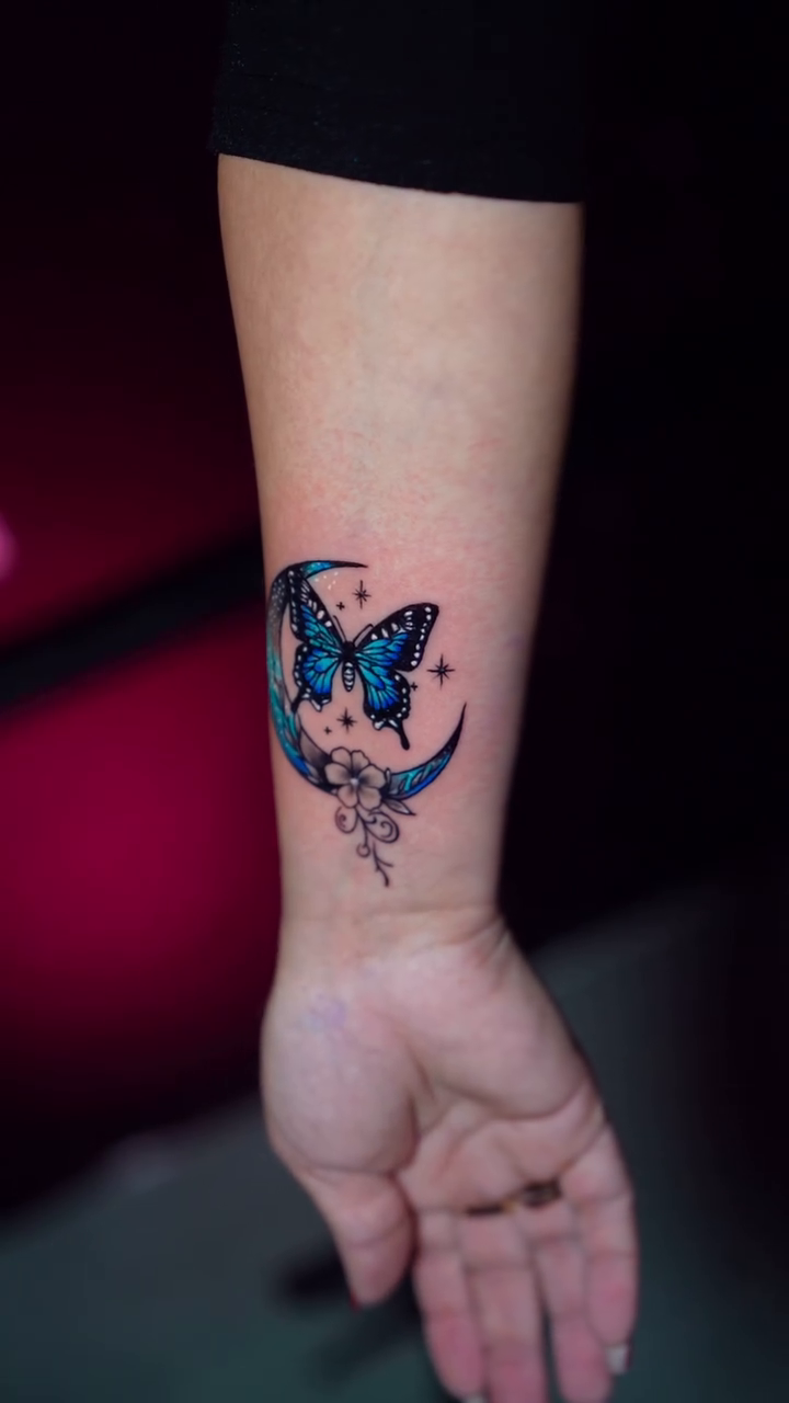 Butterfly on moon fine line tattoo by Ronald