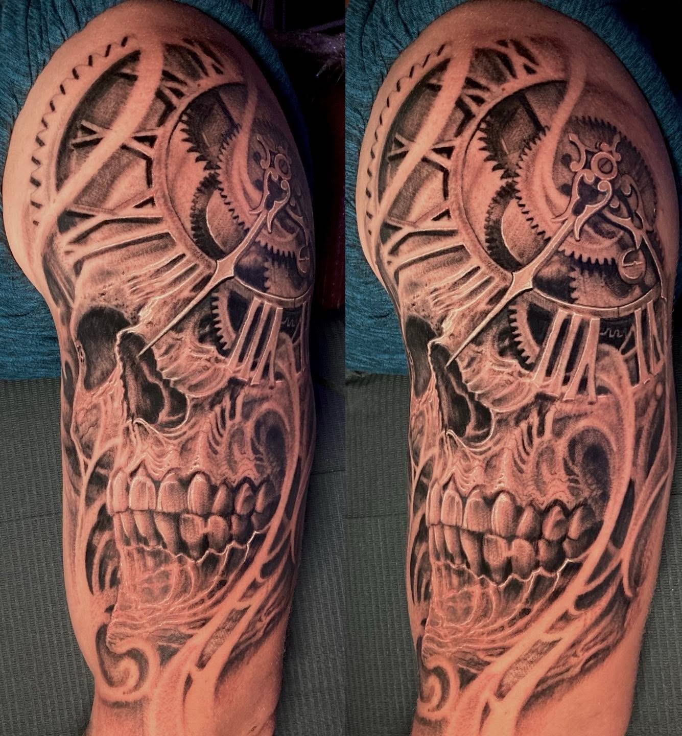 Mechanical skull realism tattoo on the forearm by Jason Wheelwright