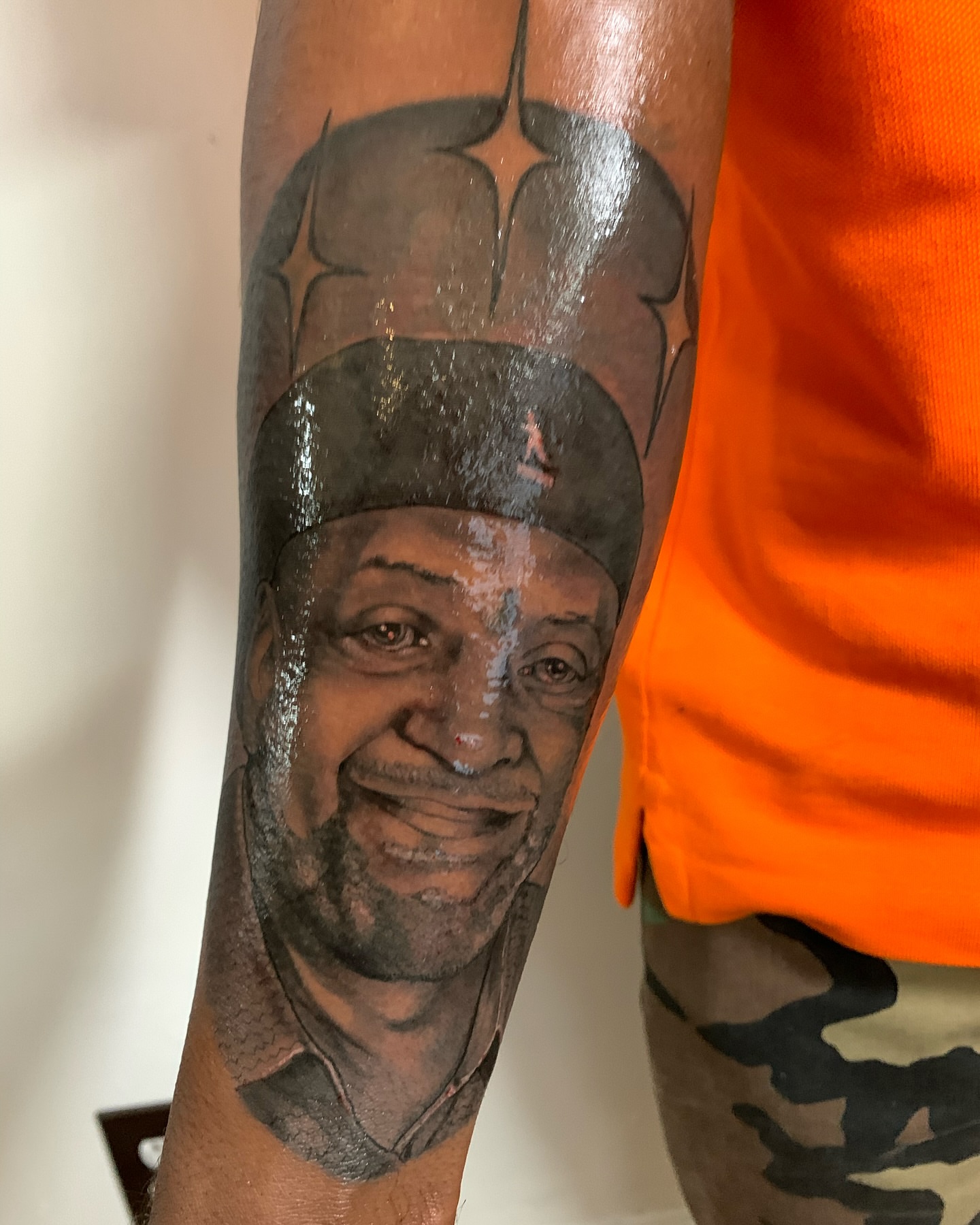 Portrait realism tattoo on the forearm by ATLANTA Queer Tattooer