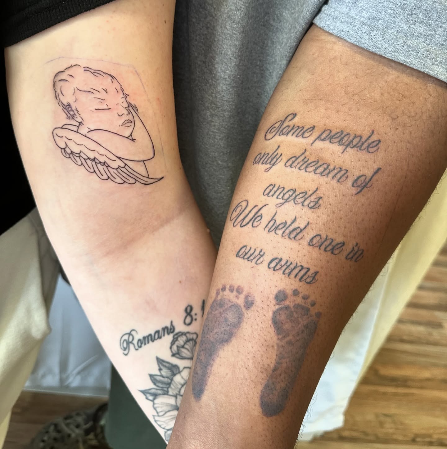 Angels and footprints realism tattoo on the thigh by Sincere