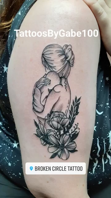 Mother and child realism tattoo by Gabriel Lawton