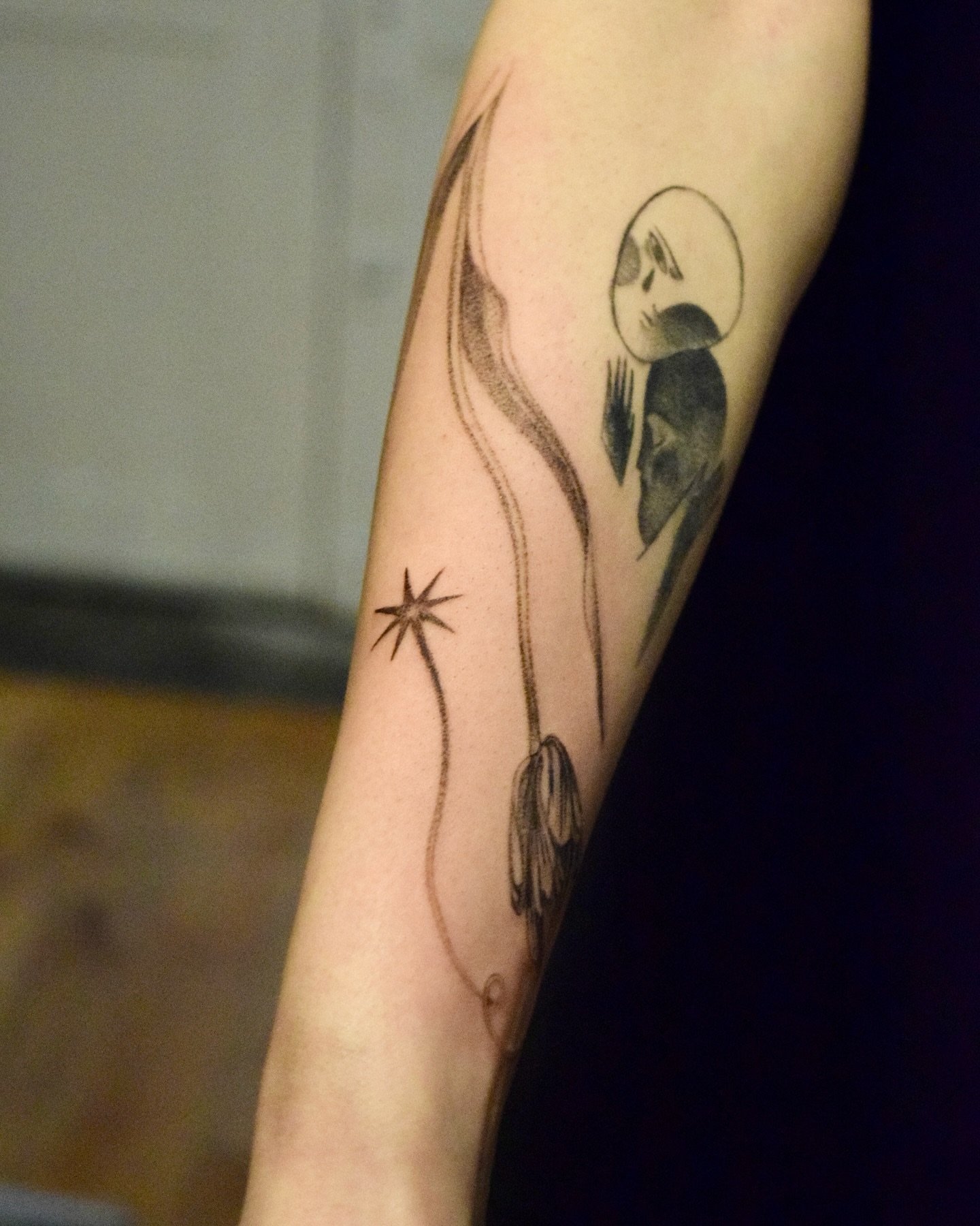 Abstract celestial dotwork tattoo on the forearm by Stella Oh