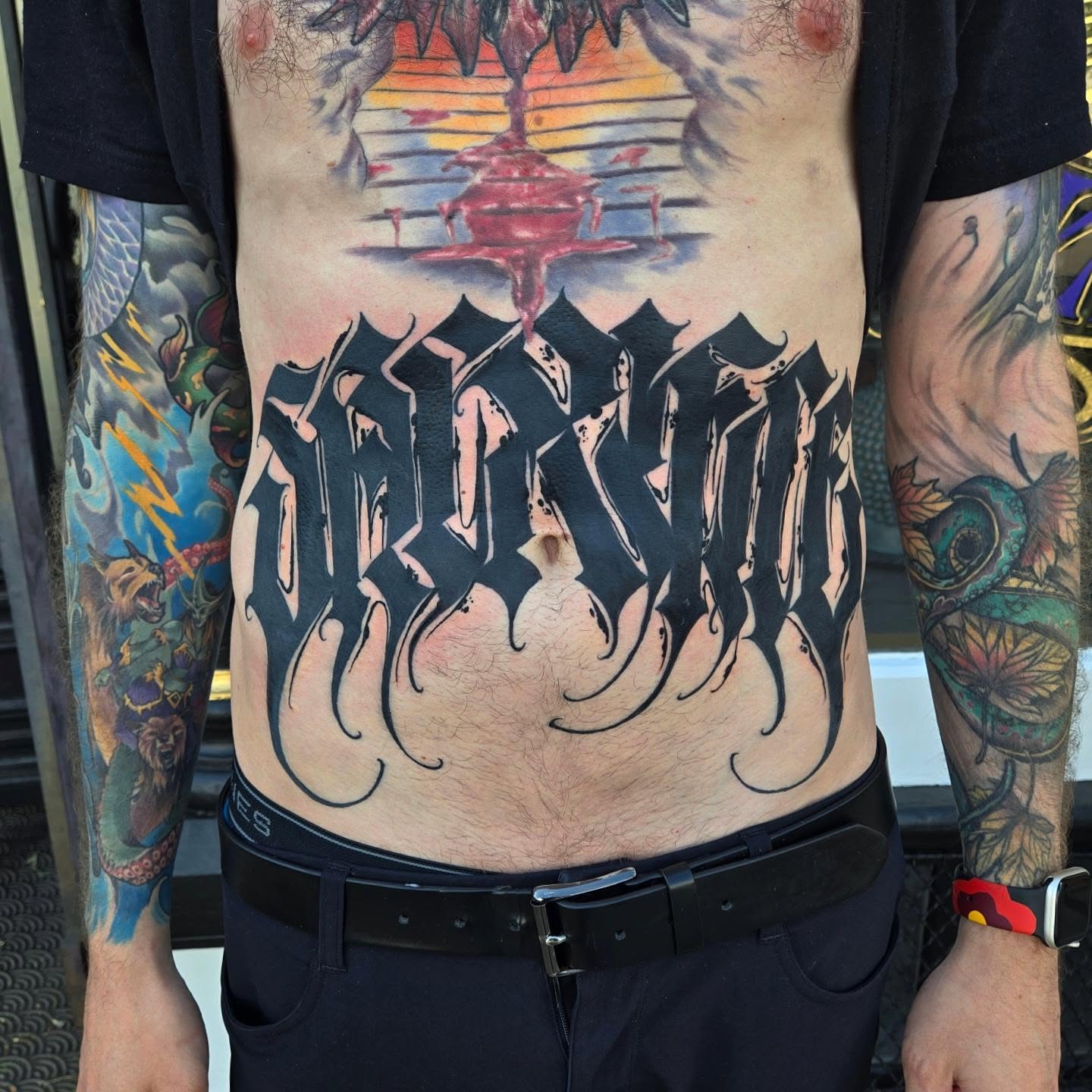 Gothic script lettering script tattoo on the torso by DiazTattoos, Denver, Colorado