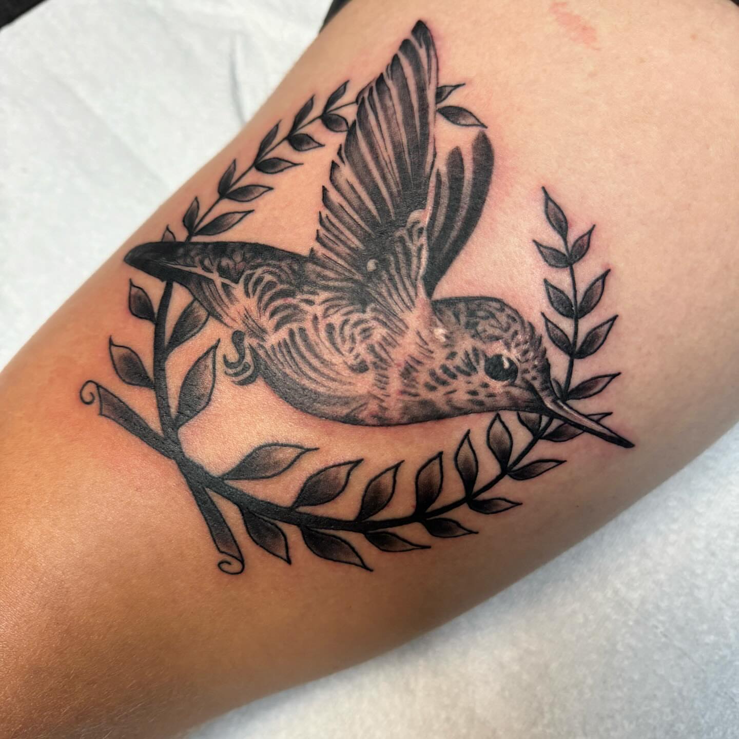 Bird black and grey tattoo on the forearm by Anthony Pichardo 🦇