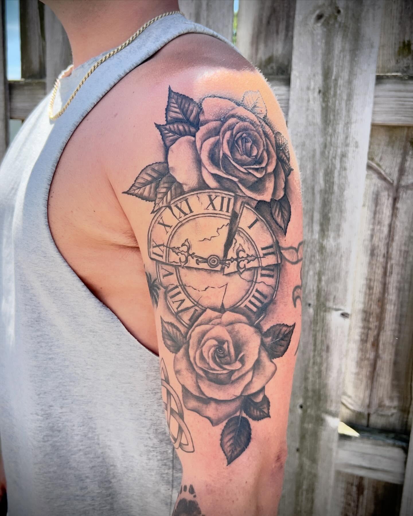 Clock and roses realism tattoo on the upper arm by Tattoos by Katherina, Willoughby, Ohio