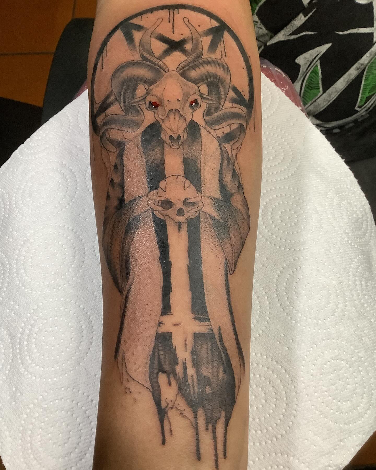 Tattoo by @alvinlouceltattooer — dark_realism, black_and_grey