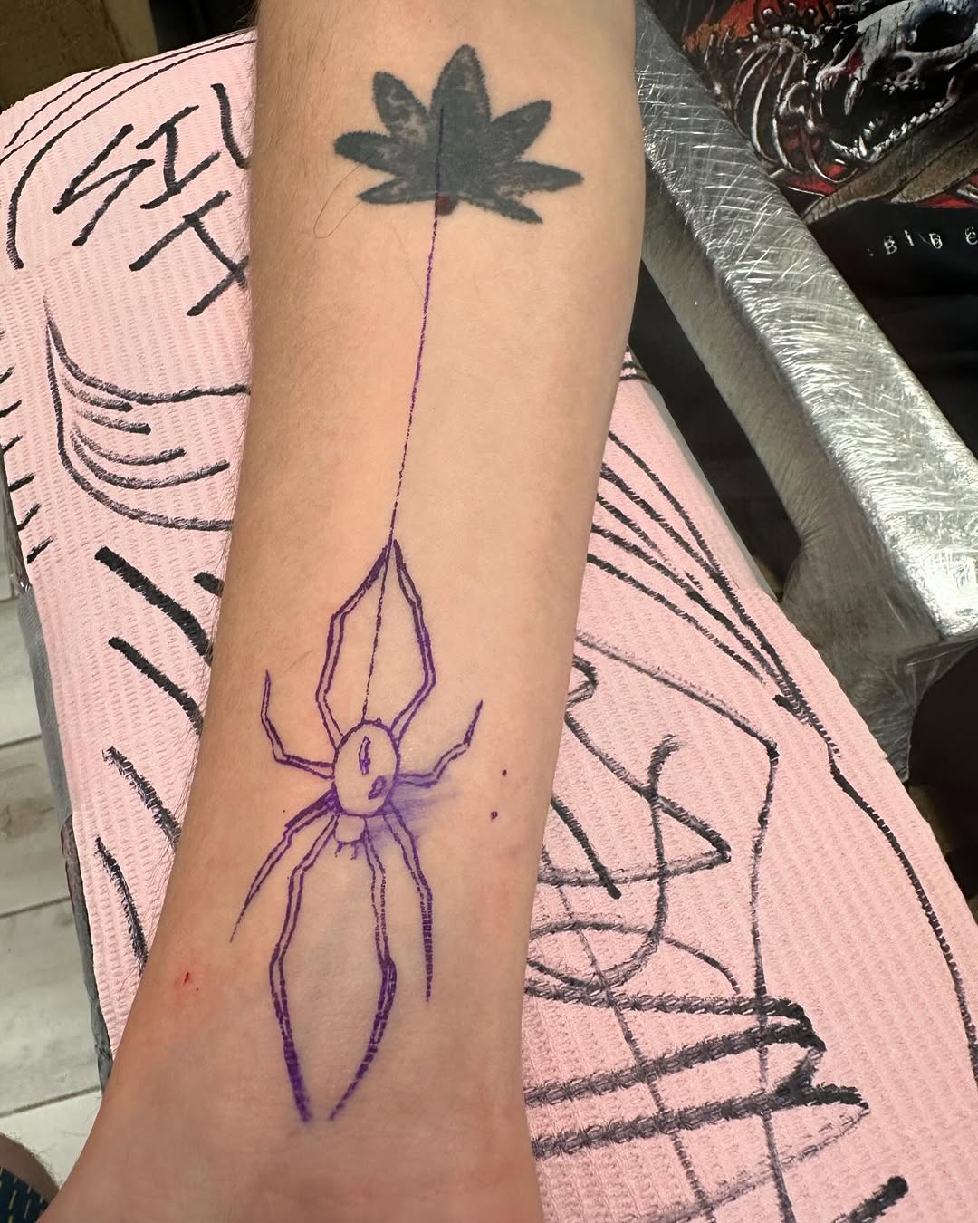 Spider hanging from a flower blackwork tattoo on the forearm by Silky Inks NJ 201, North Haledon, New Jersey