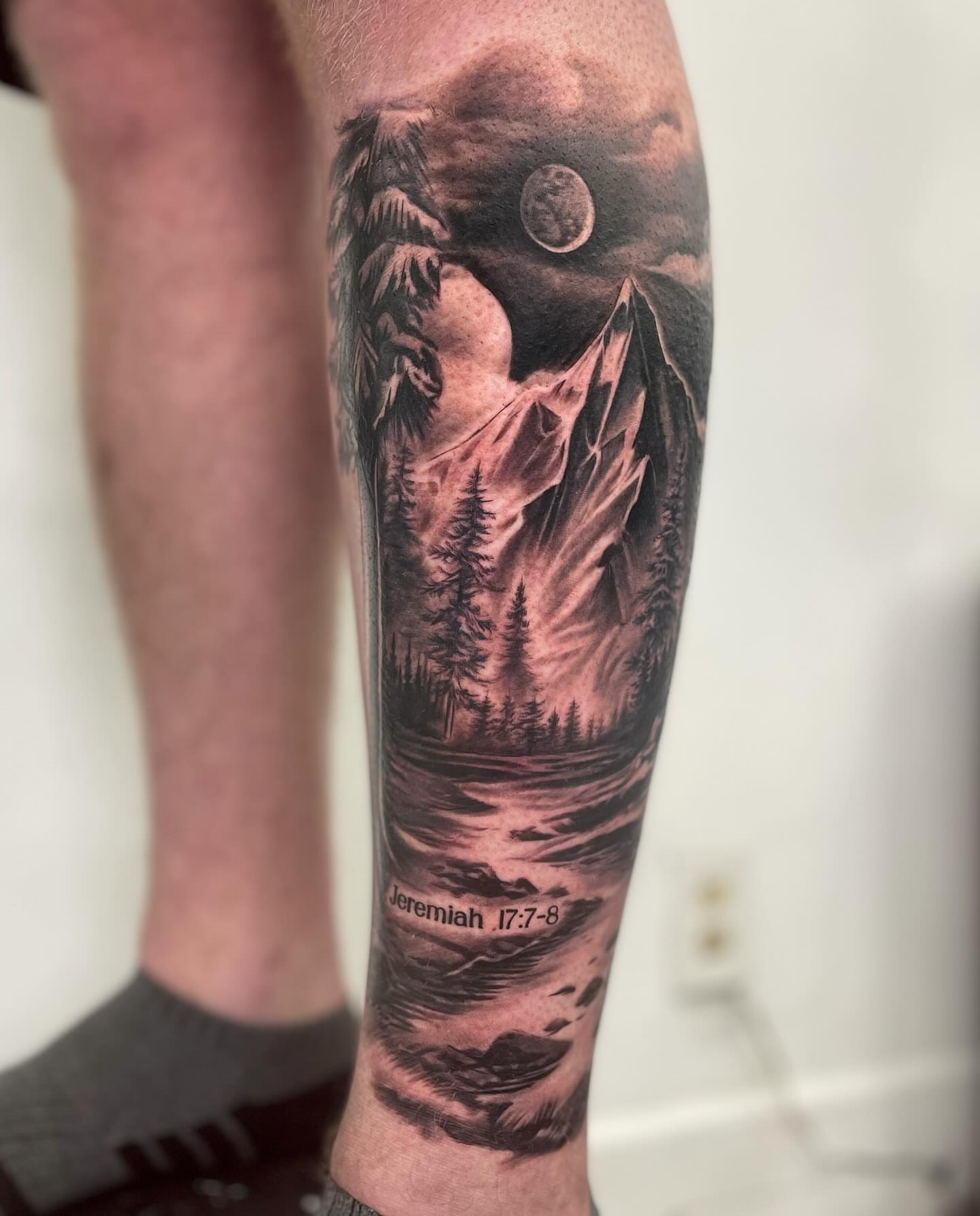 Mountain landscape realism tattoo on the forearm by Justin Reid, San Jose, California