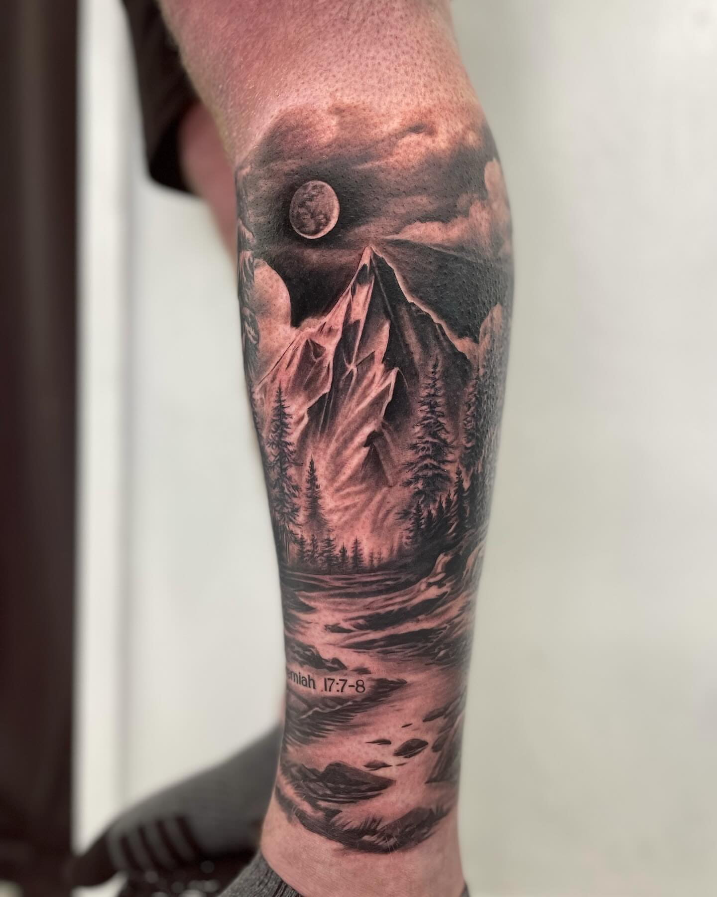 Mountain landscape realism tattoo on the forearm by Justin Reid, San Jose, California