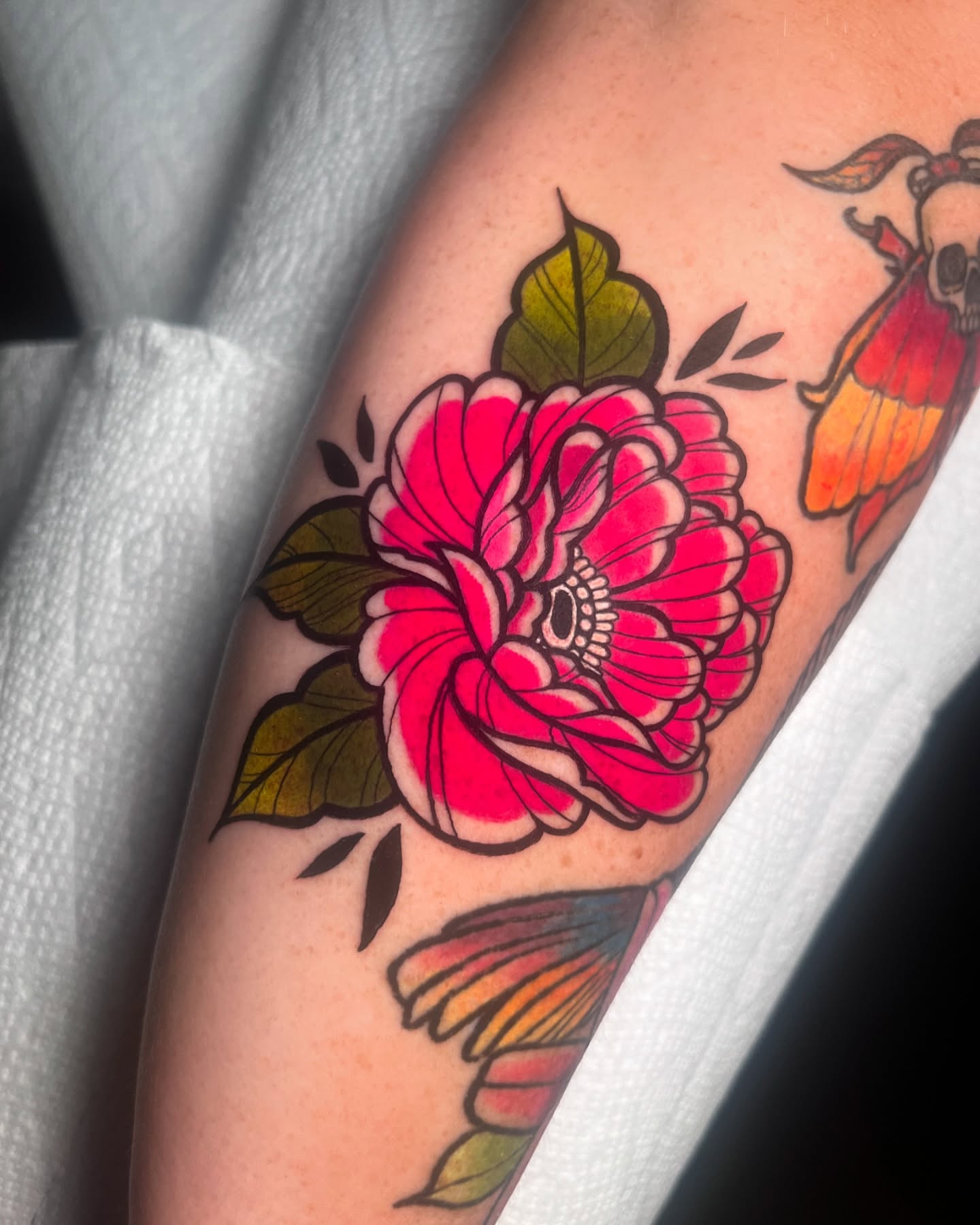 Peony flower American traditional tattoo on the forearm by ʙᴇᴄᴄᴀ ʟʏɴɴ