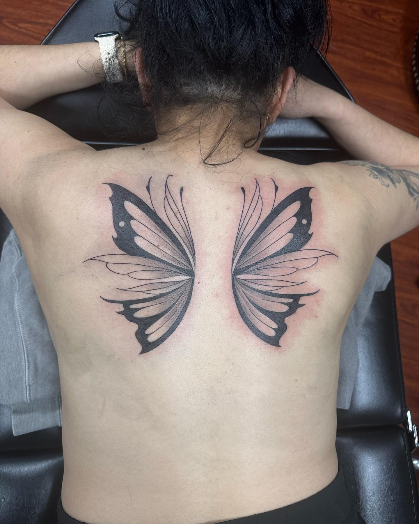 Butterfly wings black and grey tattoo on the back by Kat π