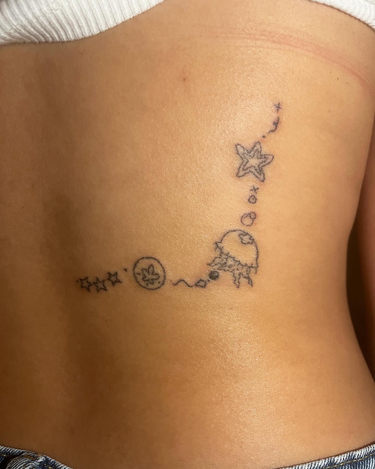 Jellyfish and stars dotwork tattoo on the ribs by hana
