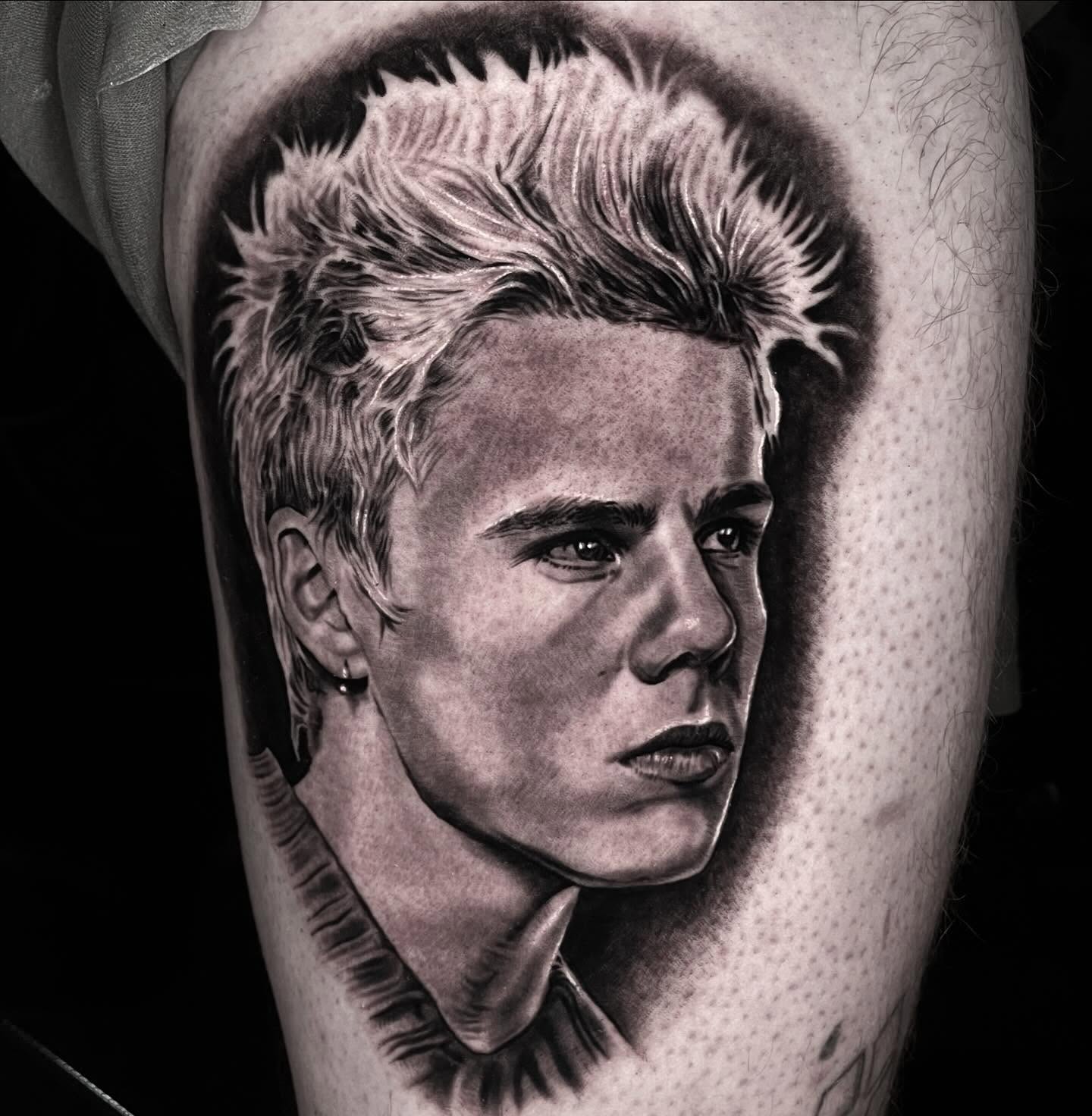 Portrait realism tattoo on the forearm by Jeremiah Warner