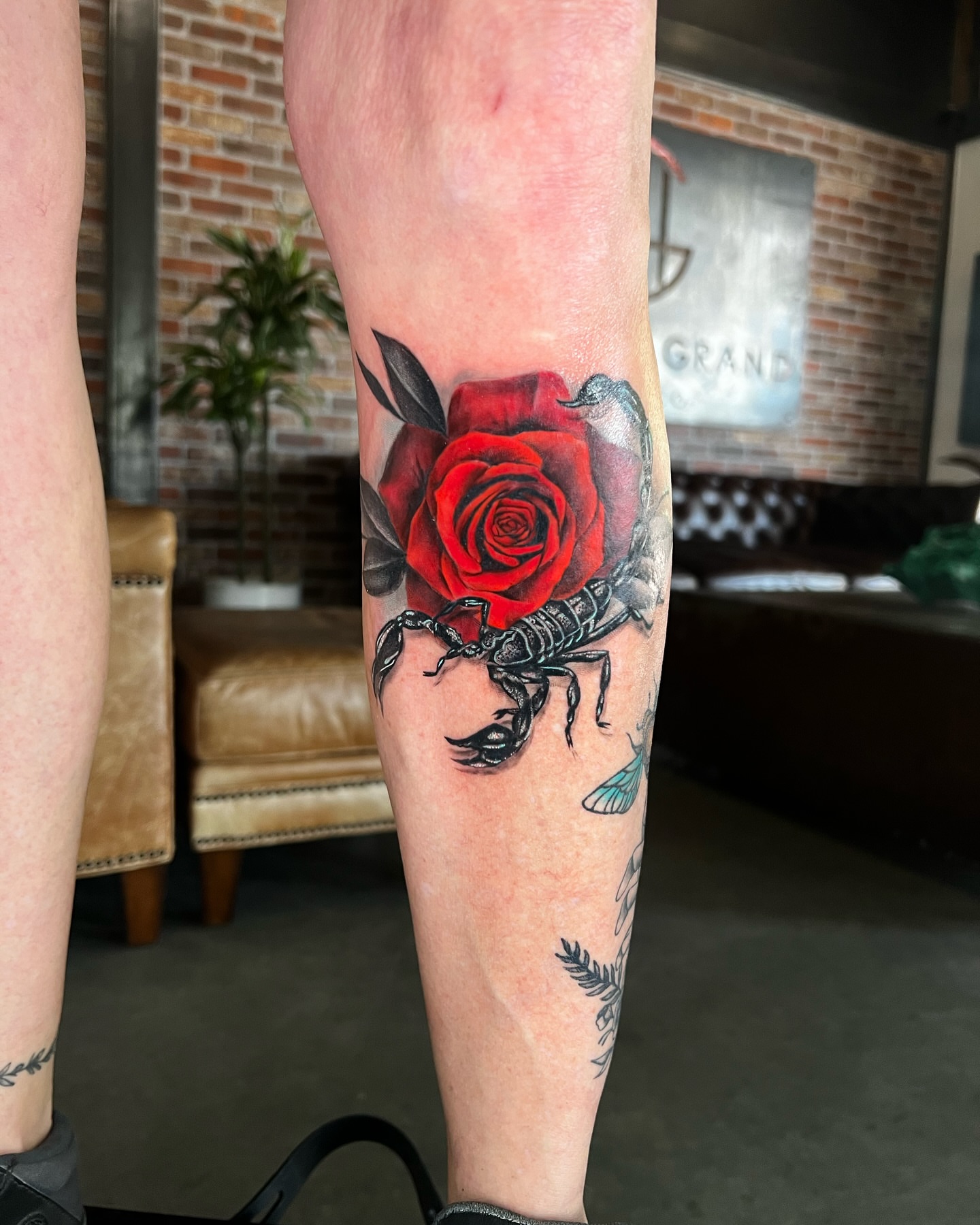 Red rose and scorpion realism tattoo on the forearm by πππππ βππ£π£ππ€ππ , Tucson, Arizona