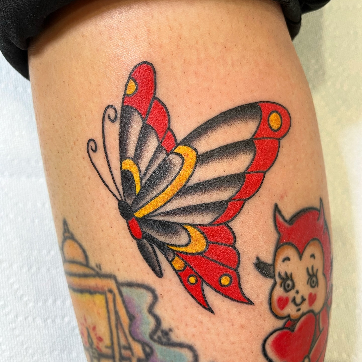 Butterfly American traditional tattoo on the thigh by Pedroux M.