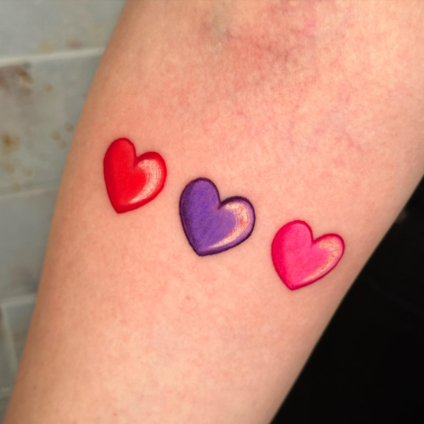 Three hearts dotwork tattoo on the forearm by Marta La Jirafa