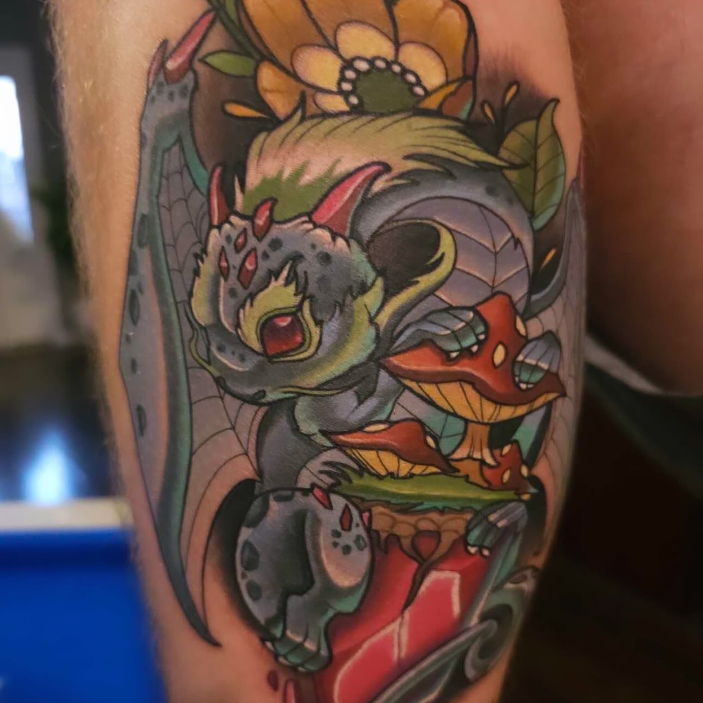 Monster with flower crown new school tattoo on the forearm by Kyle hodge