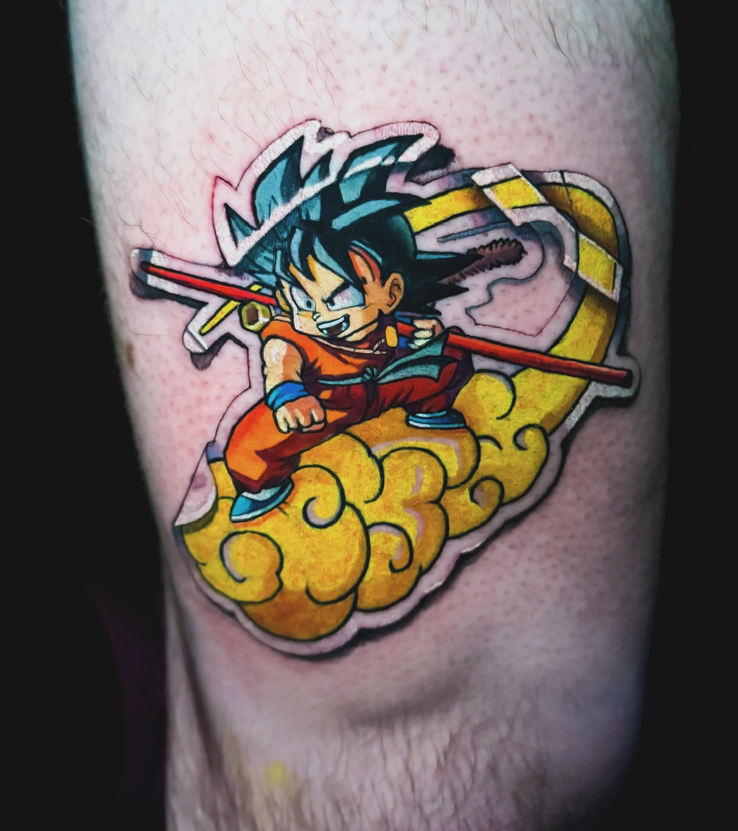 Son goku flying anime tattoo on the forearm by Tattoo artist in Seattle, WA