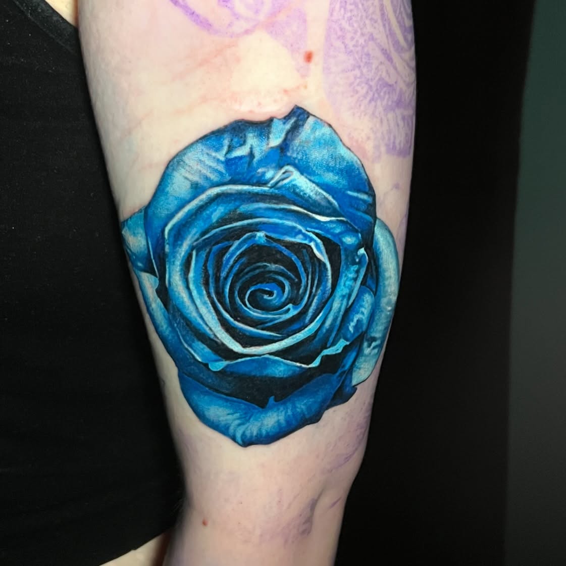 Blue rose realism tattoo on the forearm by Irina Shapiro, Somerville, Massachusetts