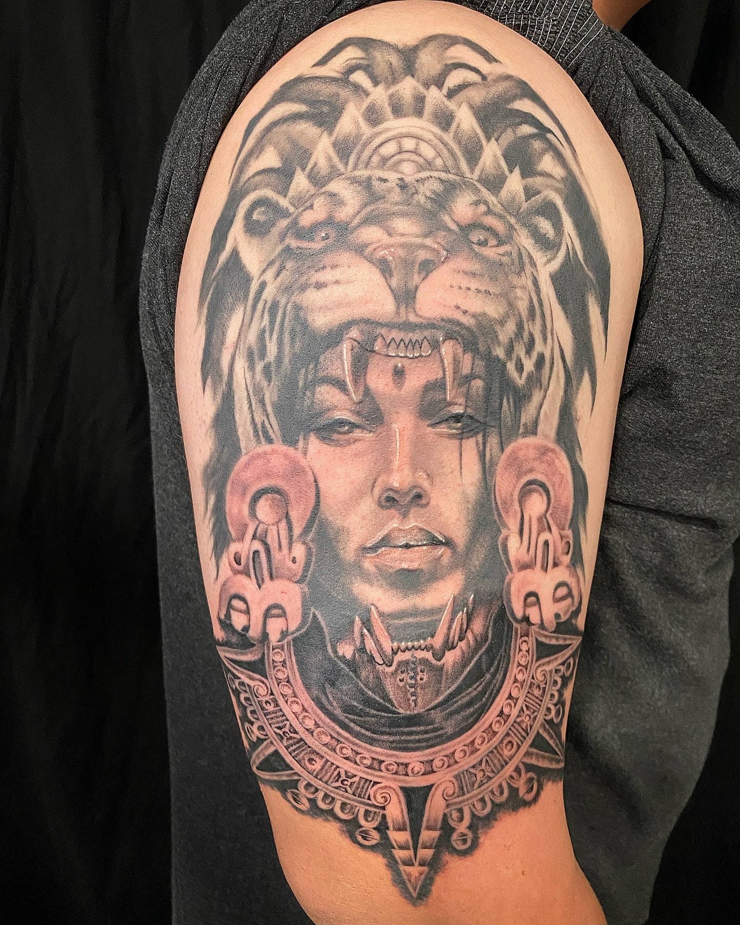 Lion and woman realism tattoo on the shoulder by El Pato, San Jose, California
