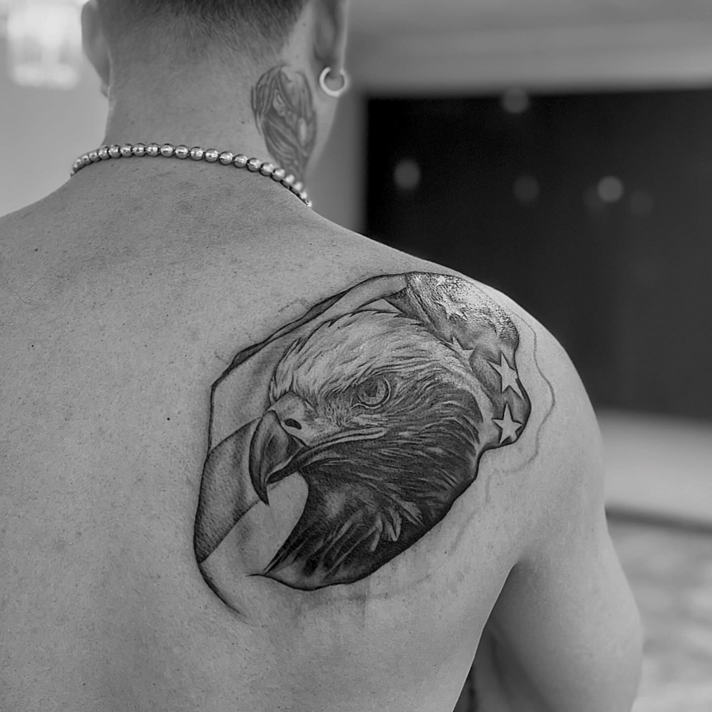 Eagle realism tattoo on the shoulder by Jocelyn
