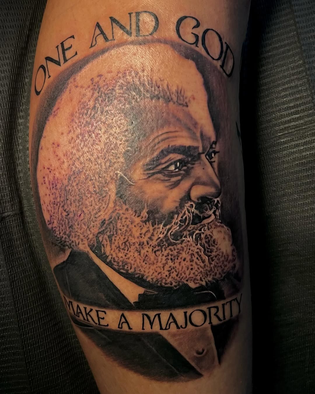 Tattoo by @thetattoosaint — realism, lettering_script