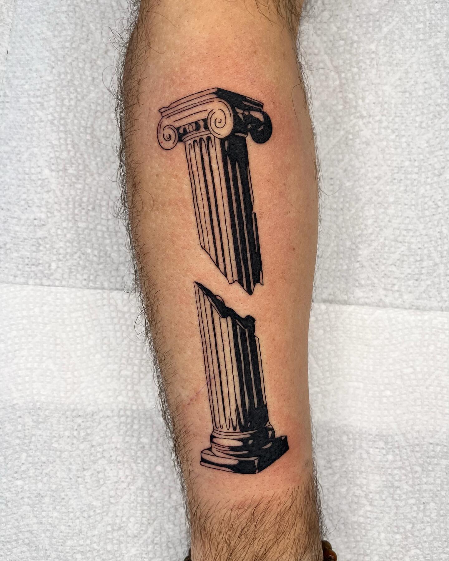Column black and grey tattoo on the forearm by zach arlan, Kansas City, Missouri