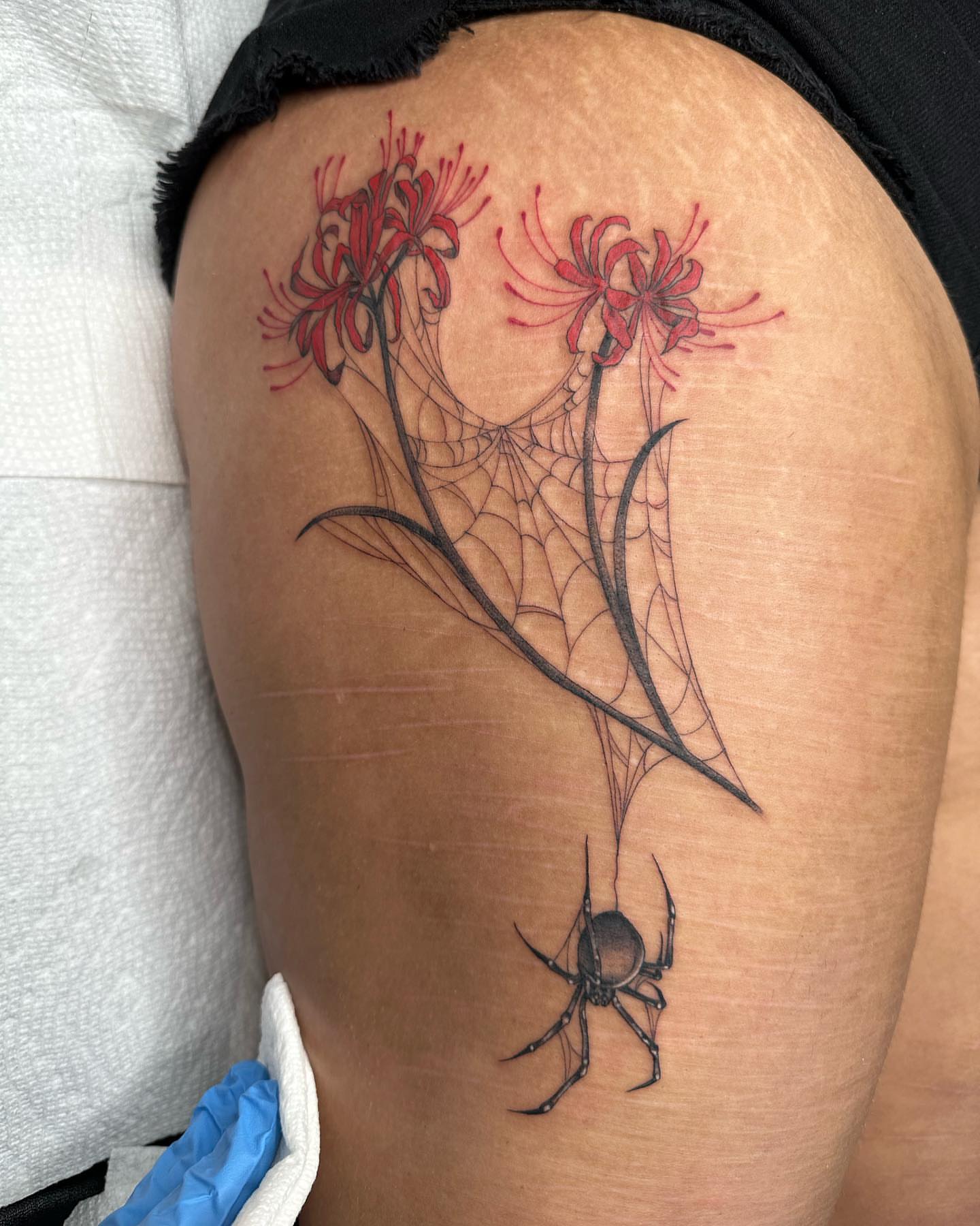 Spider and flowers realism tattoo on the thigh by ⭒ ʜᴀɪʟᴇʏ ᴍᴇᴛᴢ ⭒