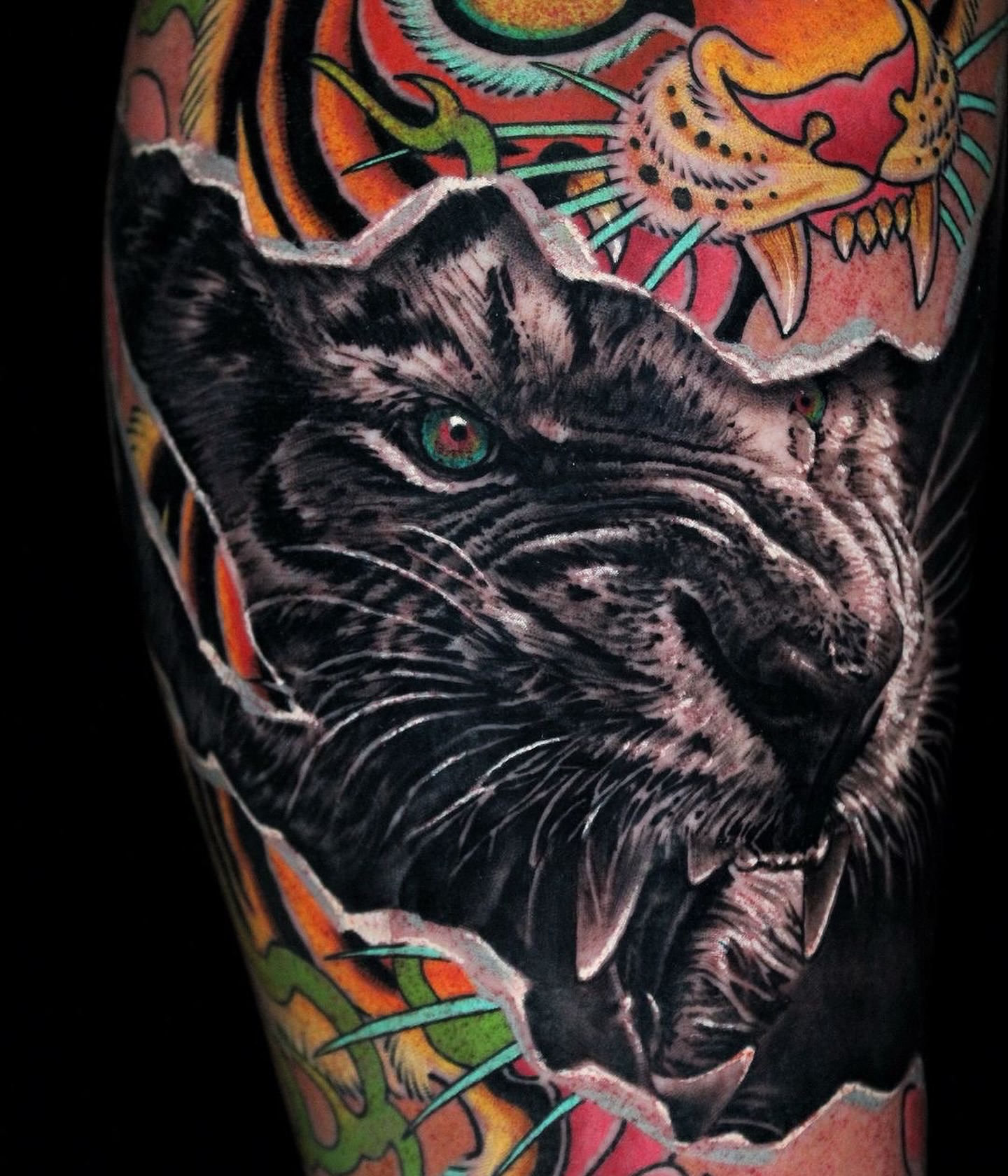 Panther realism tattoo on the forearm by Mitch Bonifay